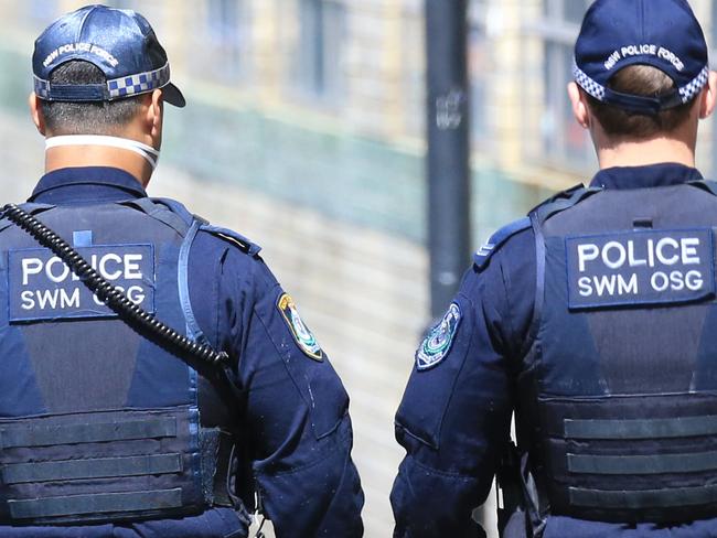 SYDNEY, AUSTRALIA - NewsWire Photos SEPTEMBER 21, 2021 - Police surrounds the CFMEU Headquarters in Pyrmont. Picture: NCA NewsWire Christian Gilles