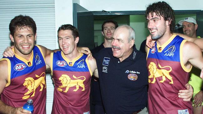 Leigh Matthews sings the song with Lions players including Craig McRae in 2002.