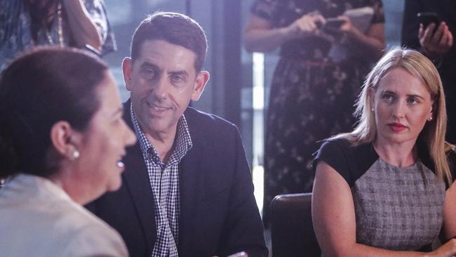 Queensland Premier Anna Palaszczuk (left) with her new economic team Cameron Dick and Kate Jones (right) in Brisbane. Picture: AAP/Glenn Hunt