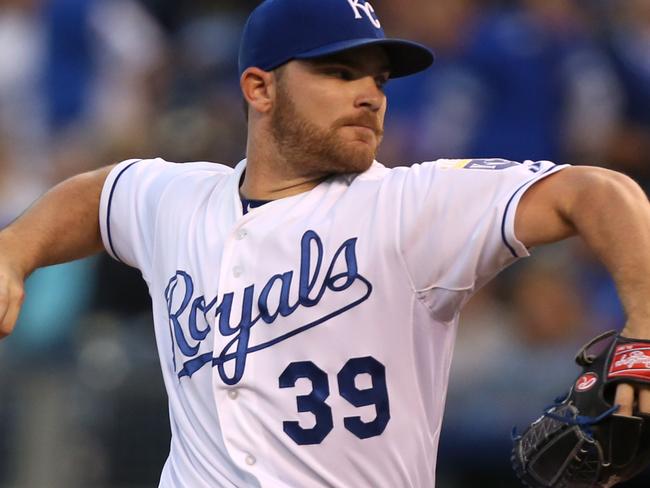 KANSAS CITY, MO - SEPTEMBER 16: Liam Hendriks #39 of the Kansas City Royals throws in the first inning during a game against the Chicago White Sox at Kauffman Stadium on September 16, 2012 in Kansas City, Missouri. (Photo by Ed Zurga/Getty Images)