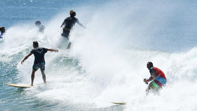 Crowds flock to surf in Noosa as the swell from ex Tropical cyclone Winston hits the Sunshine Coast. Photo Lachie Millard