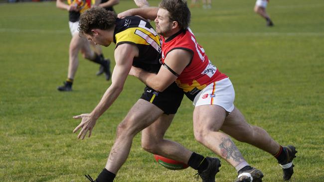 SFNL: South Mornington’s Jacob Rowler tackled by Cameron Parker of Hallam. Picture: Valeriu Campan