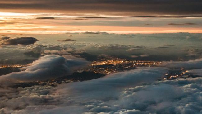 Cruise altitude after departing from Guayaquil, Ecuador, the Andes with a great sunset over Quito. Picture: Santiago Borja / www.santiagoborja.com