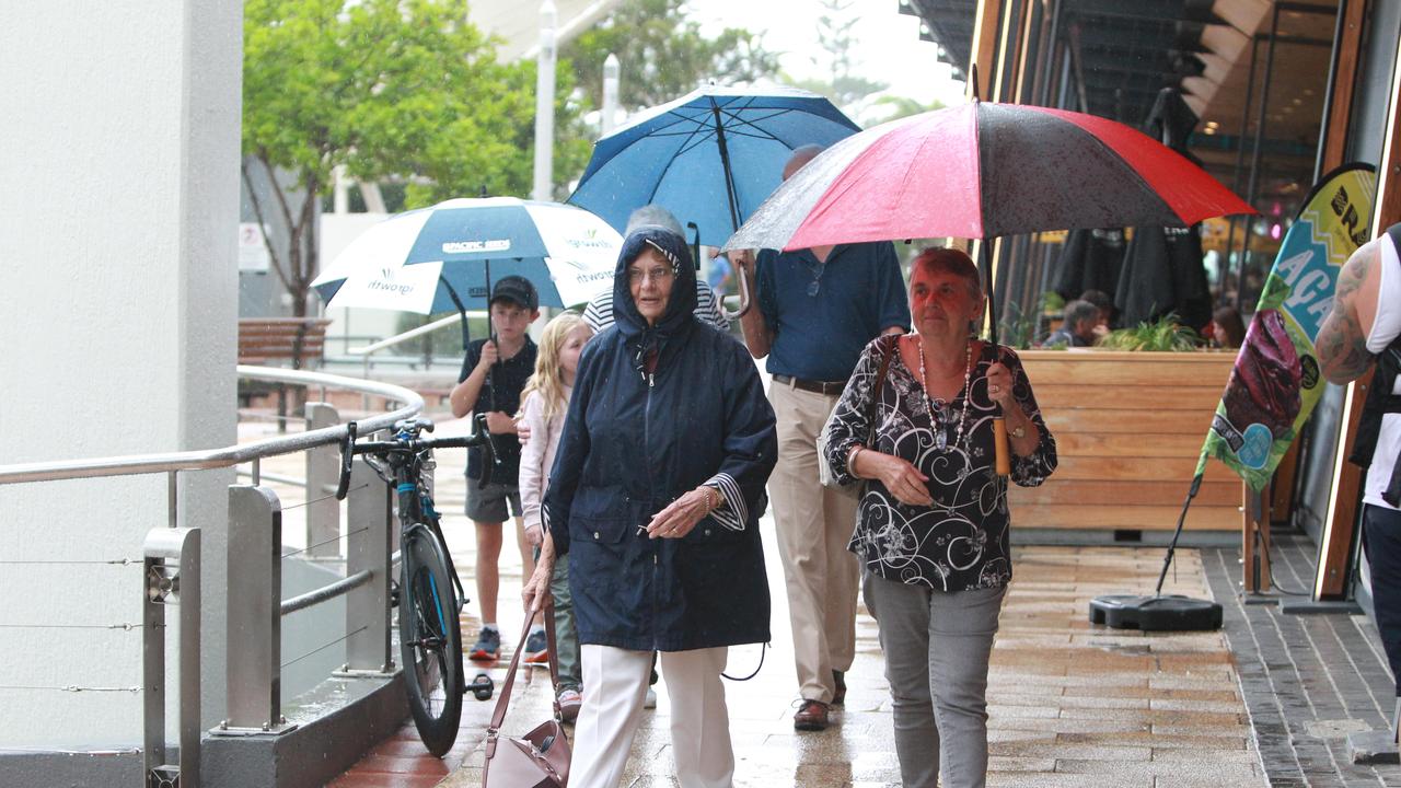 Shop keepers, visitors and Locals during Easter Sunday in the Broadbeach Mall. Pic Mike Batterham