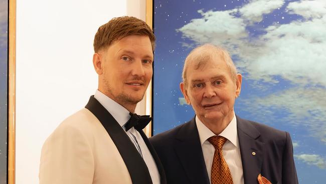 John Farnham, pictured for the first time in public since his life-saving surgery, with his son Rob Farnham on his wedding day.