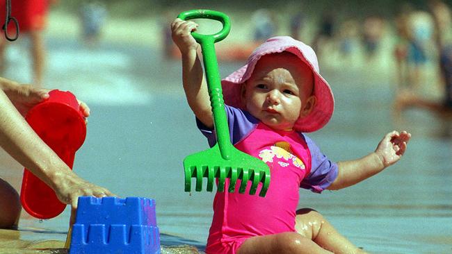 Bonita Mendel (1yr), from Corinda, playing on Mooloolaba Beach on Christmas Day, 2001.