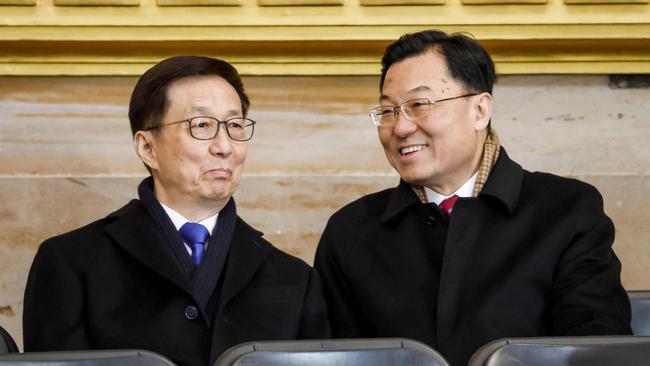 Chinese Vice-President Han Zheng, left, and the Chinese ambassador to Washington, Xie Feng, attend Donald Trump’s inauguration ceremony in the US Capitol Rotunda. Picture: AFP