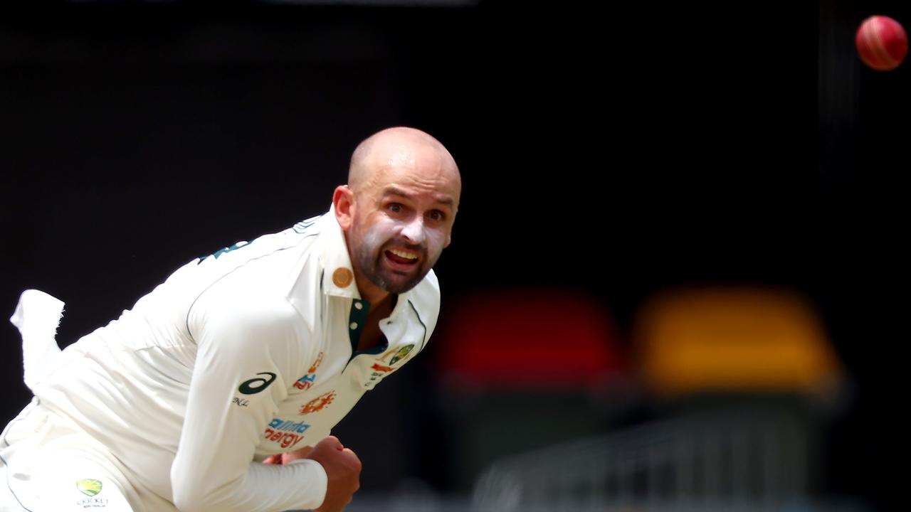 Nathan Lyon has backed Tim Paine to keep his place in the Australian team. Picture: Patrick Hamilton / AFP