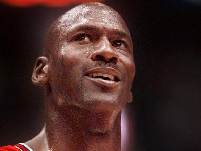 FILE -This June 14, 1998 file photo shows Chicago Bulls' Michael Jordan looking up at the score during the third quarter of their NBA Finals game against the Utah Jazz in Salt Lake City. â€œThe Last Dance,â€ ESPNâ€™s docuseries detailing the 1998 and final season of the Chicago Bulls championship dynasty, has served as a reminder to basketball fans of the greatness of Michael Jordan on the court. It also shed light on his worldwide marketing allure. (AP Photo/Mark J. Terrill, File)