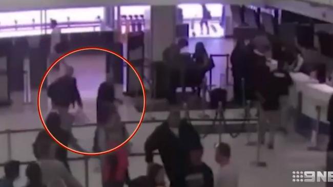 Two of the brothers are seen hauling the bomb into the airport on CCTV footage. Supplied — 9NEWS