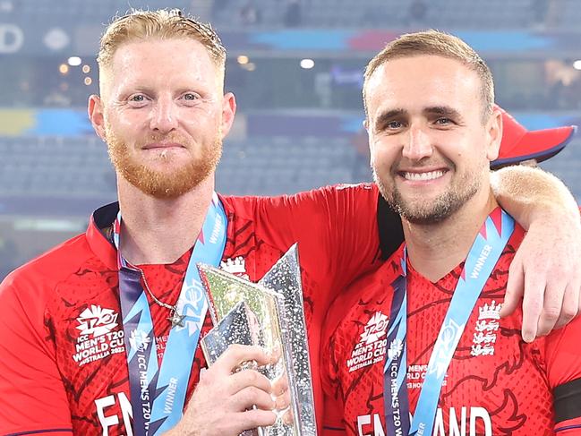 MELBOURNE, AUSTRALIA - NOVEMBER 13: Ben Stokes and Liam Livingstone of England pose with the trophy as they celebrate victory in the ICC Men's T20 World Cup Final match between Pakistan and England at the Melbourne Cricket Ground on November 13, 2022 in Melbourne, Australia. (Photo by Mark Kolbe/Getty Images)