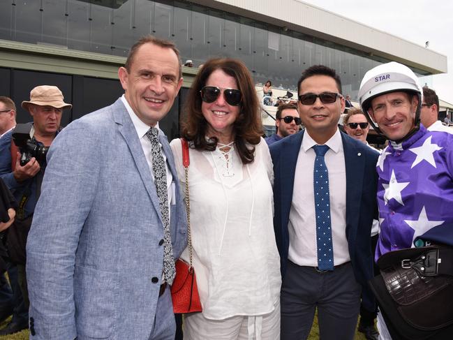 Winner of race 5 Invincibella jockey Hugh Bowman with owners Oliver Enriquez Kathryn Wood-Enriquez and trainer Chris Waller at the Magic Millions race day at the Gold Coast Turf Club. (Photo/Steve Holland)