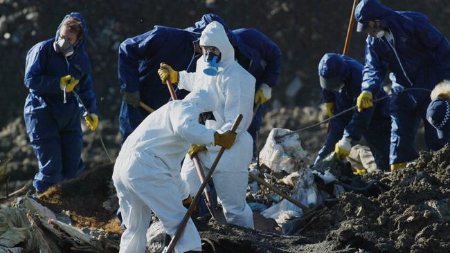 Police searching the Devilsbend landfill site for the bodies of Gracie Sharpe and Anna Kemp.