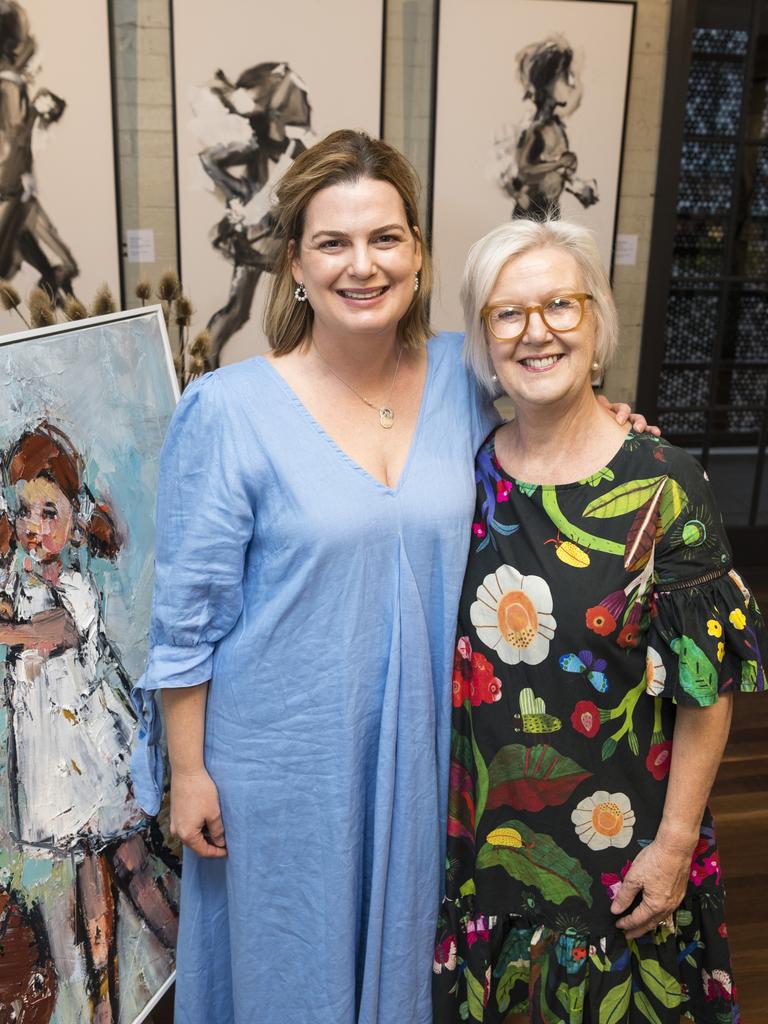 Jacqui Thompson (left) and Pamela Davidson at the opening of Unbridled by Joanna Davies at The Toowoomba Gallery, Thursday, October 21, 2021. Picture: Kevin Farmer