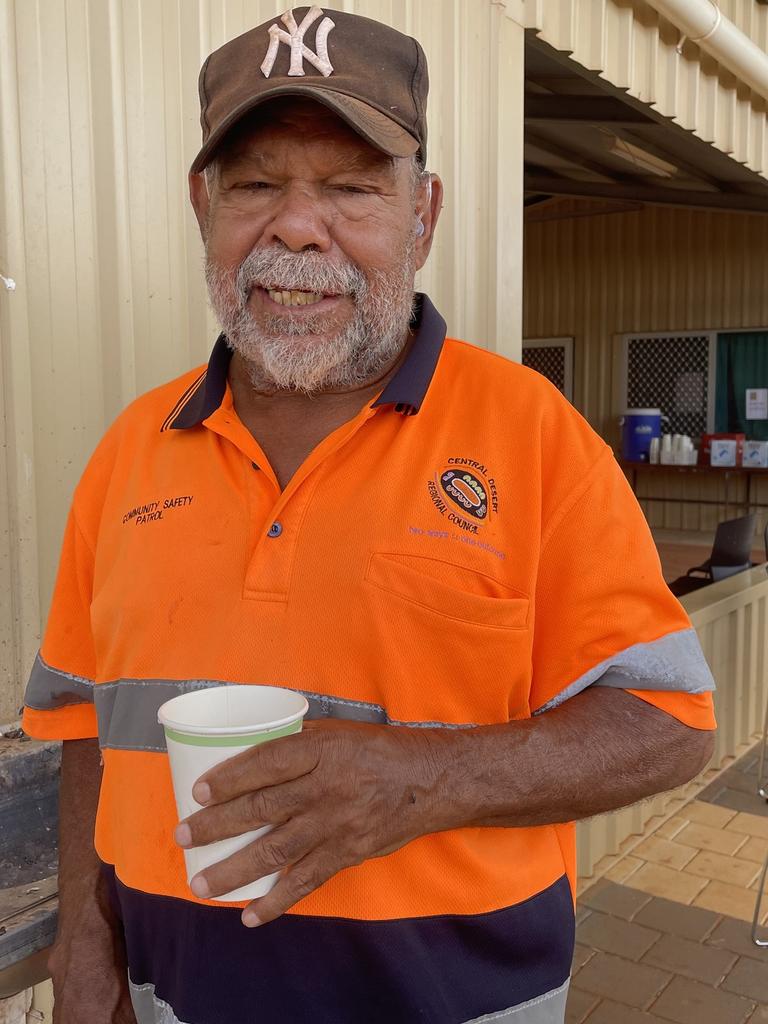 Laramba community leader Ron Hagan enjoys a glass of water treated by the new Laramba water treatment plant. Picture: Supplied, Central Land Council Facebook.