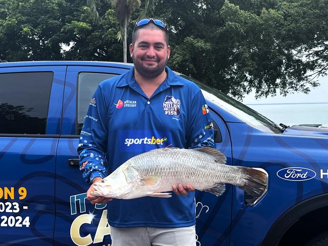 Beau Cartledge with his catch.