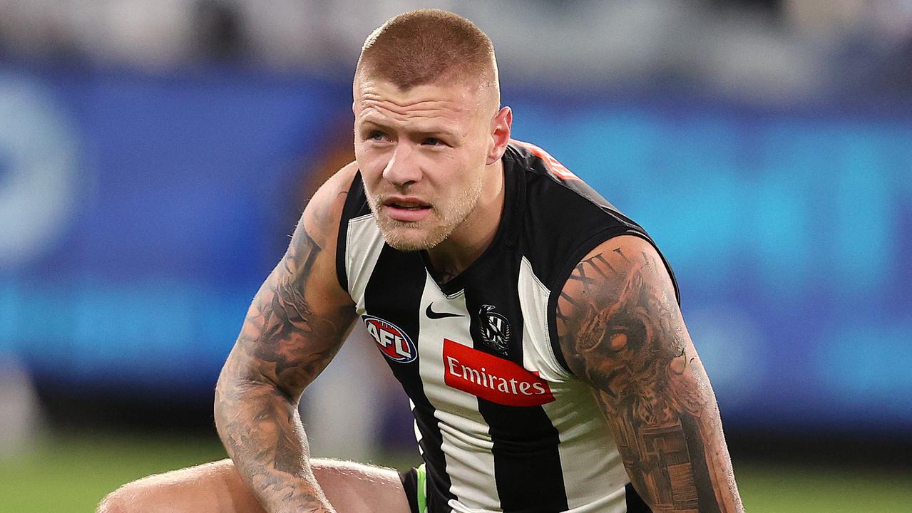 AFL Round 4. 10/04/2021. Collingwood v Greater Western Sydney at the MCG. Jordan De Goey of the Magpies after landing awkwardly after trying to mark low down . Pic: Michael Klein