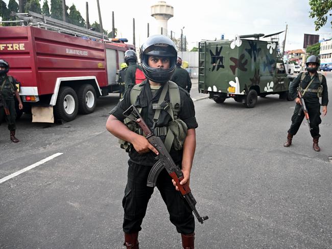 Sri Lankan soldiers secure an area near St Anthony's Shrine. ISIS has claimed responsibility for the horrific bombings.