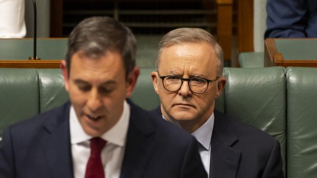 Anthony Albanese looks on as Jim Chalmers delivers the 2022-23 Federal Budget.