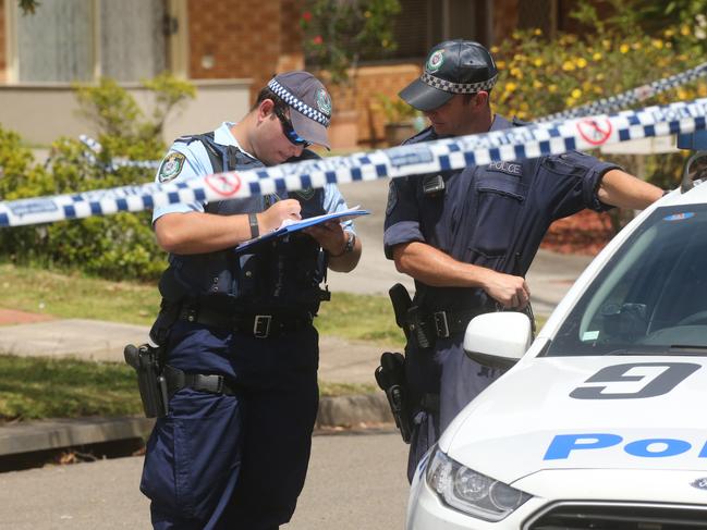 Police outside the Georges Hall home where Hamad Assaad was shot dead by two gunmen.