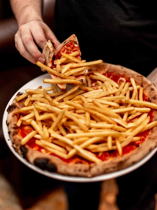 Cavallino’s margherita pizza topped with fries. Picture: @kerabeareats