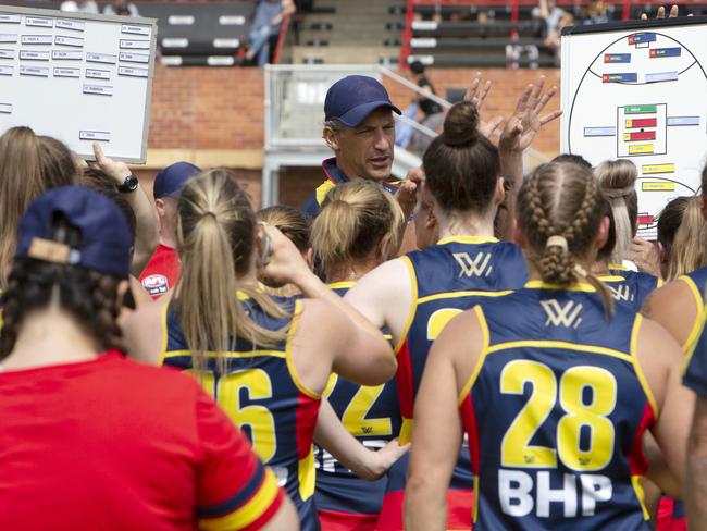 Crows coach Matthew Clarke talks to his squad during a trial game against GWS at Richmond Oval in January. Picture: AAP/Emma Brasier