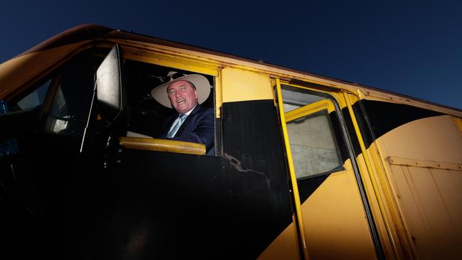Deputy Prime Minister and Minister for Infrastructure and Transport Barnaby Joyce poses for photos in the driver's seat of the train as he farewells Elvis fans boarding the Elvis express train, who were attending the Parkes Elvis Festival, in Parkes, NSW, on Monday 15 January 2017.