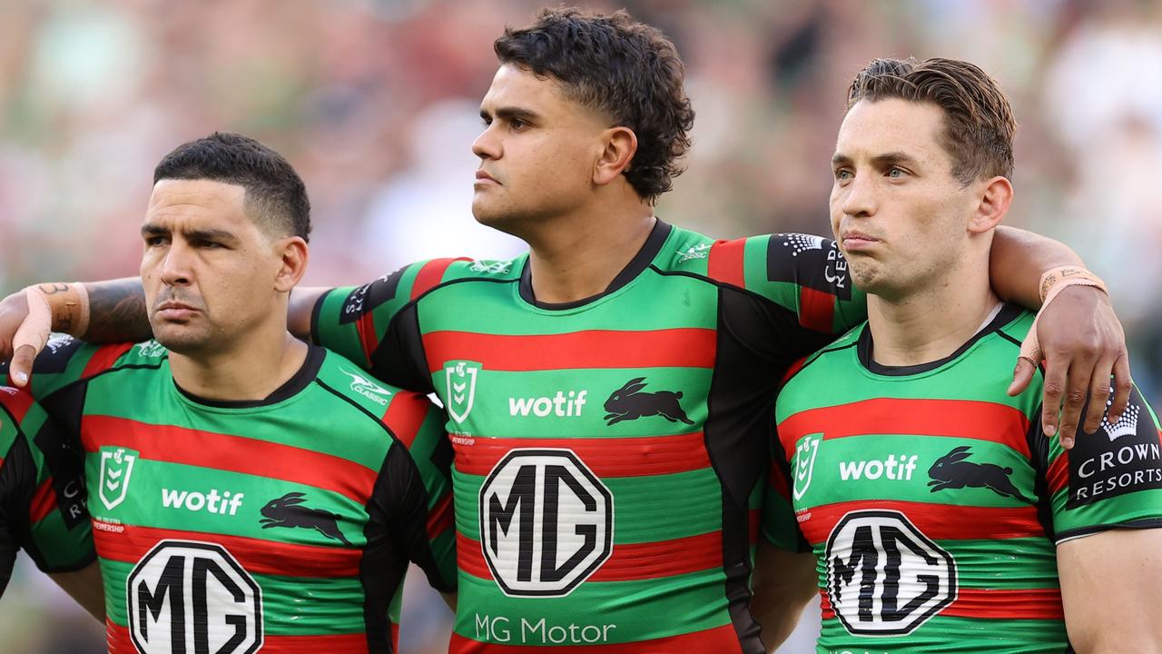 SYDNEY, AUSTRALIA - SEPTEMBER 11: (L-R) Damien Cook, Cody Walker, Latrell Mitchell and Cameron Murray of the Rabbitohs observe a minute's silence for the passing of Her Majesty Queen Elizabeth II during the NRL Elimination Final match between the Sydney Roosters and the South Sydney Rabbitohs at Allianz Stadium on September 11, 2022 in Sydney, Australia. (Photo by Mark Kolbe/Getty Images)