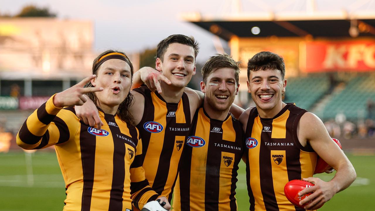 MELBOURNE, AUSTRALIA - JUNE 08: Jack Ginnivan, Connor Macdonald, Dylan Moore and Massimo D'Ambrosio of the Hawks pose for a photo during the 2024 AFL Round 13 match between the Hawthorn Hawks and the GWS GIANTS at UTAS Stadium on June 08, 2024 in Launceston, Australia. (Photo by Dylan Burns/AFL Photos)