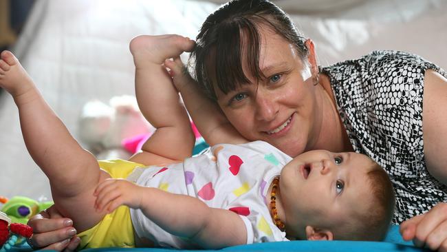 Olivia Weston with her six-month-old daughter Liana, who loves being on the floor doing tummy-time exercises. Picture: Adam Head