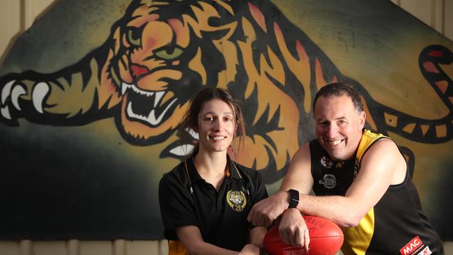 Brenton Cabban, 49, with daughter Amber, will play his 500th game for Weeroona Bay Football Club in Whyalla on Saturday. Picture: TAIT SCHMAAL.