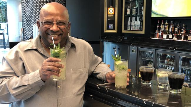 Reporter Lawrence Machado trying out the delicious mojitos with and without alcohol.