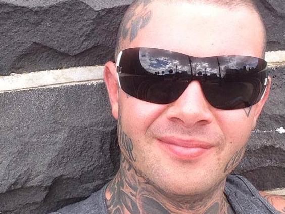 Mongols bikie Mark James Graham manages the Victims of Ink tattoo studio in Port Melbourne. The parlour is one of a chain of three owned by his brother.