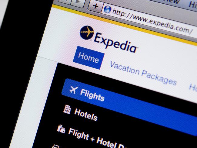 The Expedia Inc. homepage is displayed on laptop computers arranged for a photograph in Washington, D.C., U.S., on Tuesday, Oct. 29, 2013. Expedia Inc. is expected to release earnings figures on Oct. 30. Photographer: Andrew Harrer/Bloomberg