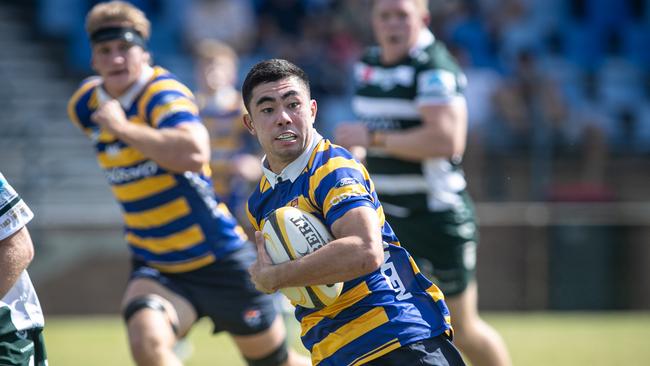 Sydney Uni player Dane Mitchell scoring