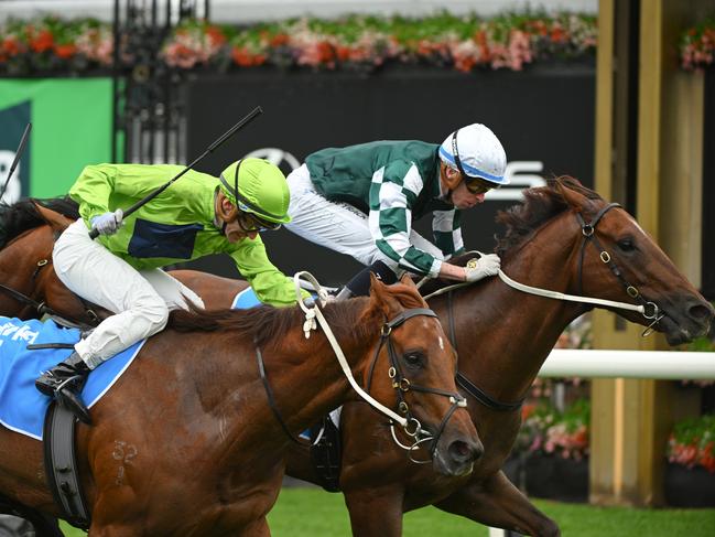 MELBOURNE, AUSTRALIA - OCTOBER 05: Michael Dee riding riding First Settler defeats Luke Currie riding Reserve Bank in Race 5, the Cirka Danehill Stakes - Betting Odds during Melbourne Racing at Flemington Racecourse on October 05, 2024 in Melbourne, Australia. (Photo by Vince Caligiuri/Getty Images)