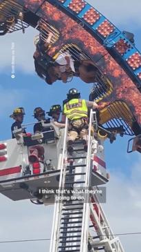 Rollercoaster riders stuck upside down after coaster malfunctions