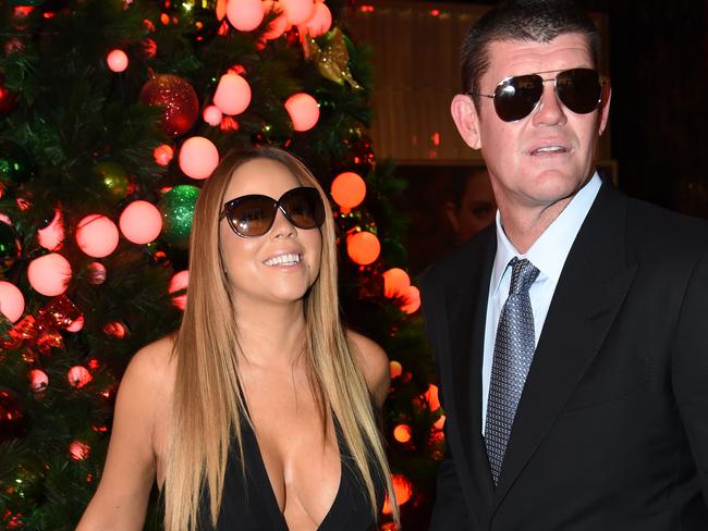 Mariah Carey is greeted by James Packer at the Crown Atrium. Picture: Tony Gough