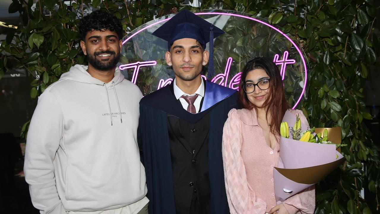 Suraj Shridhar, Himanshu and Nitya Handra at Deakin University post-graduation celebrations on Friday afternoon. Picture: Alan Barber