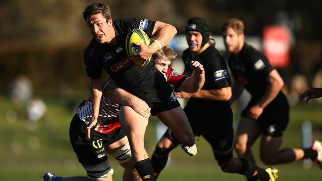 Jake Gordon of the Eagles is tackled at Viking Park in Canberra.
