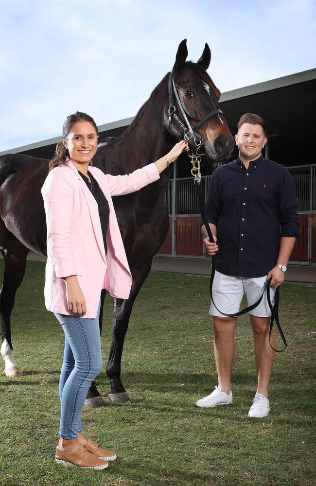 Trainer Matt Hoysted with wife Caitlin Hoysted and local hope Scallopini. Picture: Liam Kidston