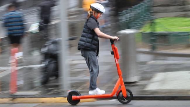 MELBOURNE, AUSTRALIA - NewsWire Photos, SEPTEMBER 26, 2022. Scooter riders in Melbourne CBD. Picture  : NCA NewsWire / David Crosling