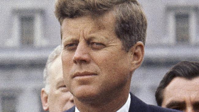 FILE - In this April 30, 1963 file photo, President John F. Kennedy listens while Grand Duchess Charlotte of Luxembourg speaks outside the White House in Washington. National Park Rangers will lay a wreath outside Kennedy's childhood home on Wednesday, Nov. 22, 2017, in Brookline Mass., 54 years to the day after he was assassinated in Dallas. The ceremony marks a symbolic end to a year of events marking the 100th anniversary of JFK's birth. (AP Photo/William J. Smith, File)