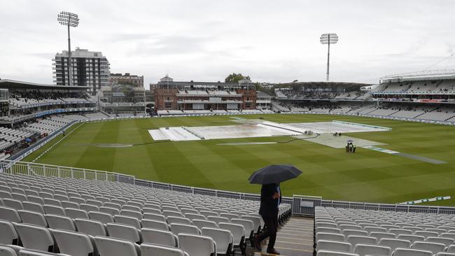 A lone spectator waits in vain for the start of play at Lord’s overnight. Picture: AP