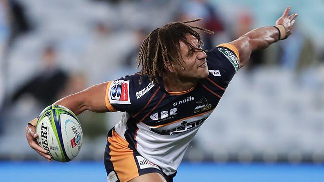 SYDNEY, AUSTRALIA - JULY 18: Issak Fines of the Brumbies celebrates scoring a try during the round three Super Rugby AU match between the Waratahs and the Brumbies at ANZ Stadium on July 18, 2020 in Sydney, Australia. (Photo by Mark Metcalfe/Getty Images)