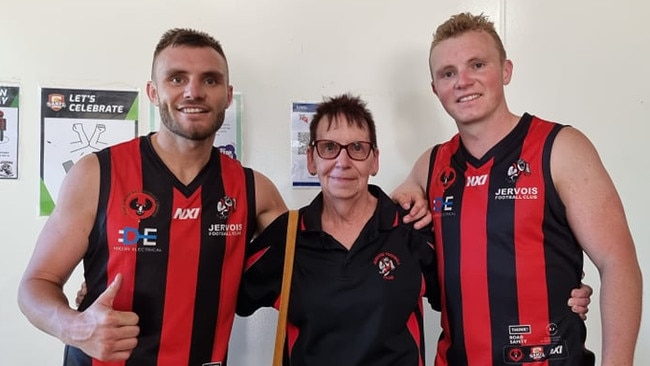 Dylan and Zane Barry with their grandmother Viola Lambert (middle) at the RMFL game Todd filmed. Picture: Supplied