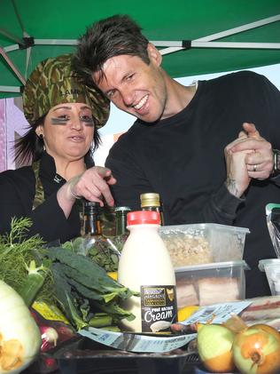 Jacqui Lambie and Ben Milbourne as the “mystery box” of Tasmanian ingredients is unveiled. Picture: CHRIS KIDD