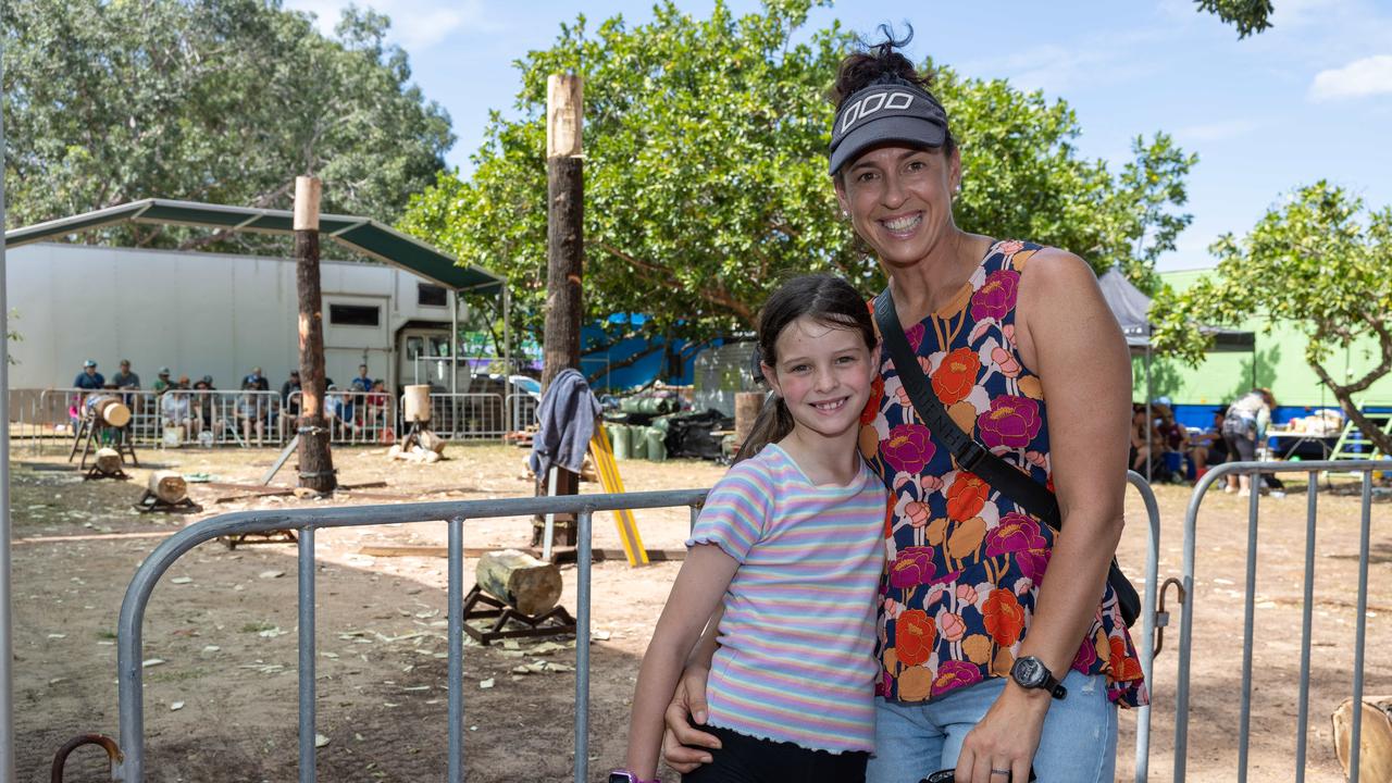 Stephanie Watt and Layla Watt enjoying the woodchopping. Picture: Pema Tamang Pakhrin