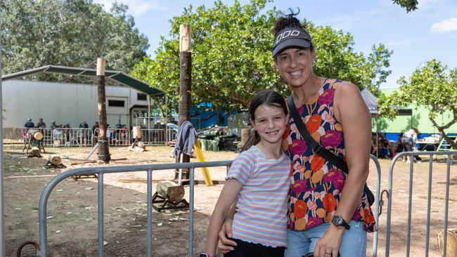Stephanie Watt and Layla Watt enjoying the woodchopping. Picture: Pema Tamang Pakhrin