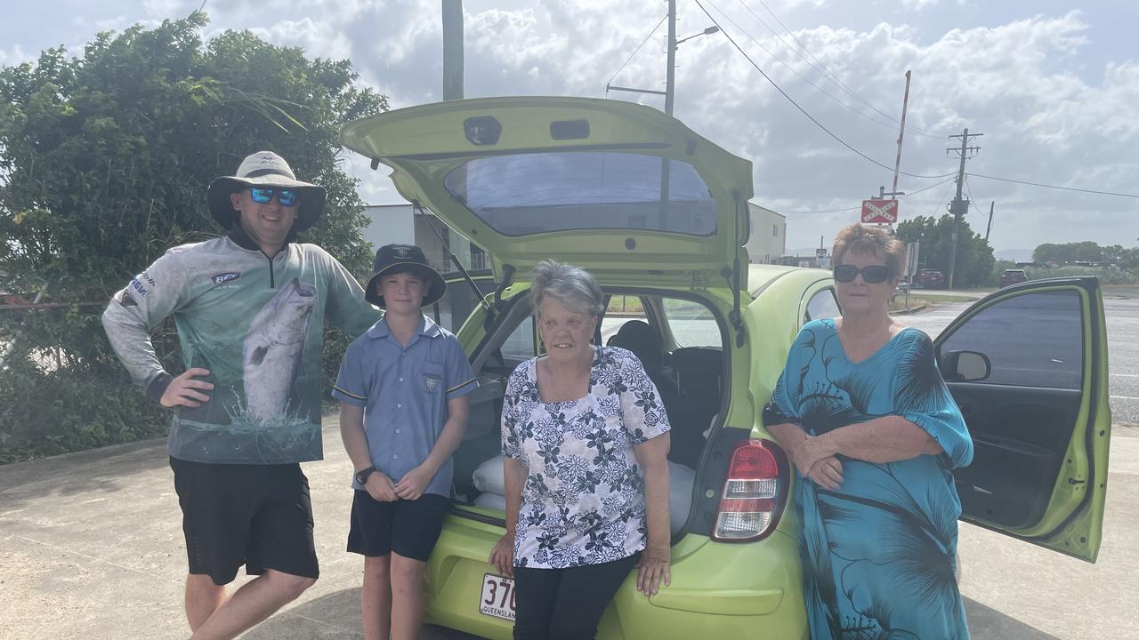 Luke and Jackson Paroz, Janet Morris and Mary Eglington in front of the SES station in Proserpine filling up bags of sand ahead of cyclone Kirrily. Picture: Estelle Sanchez